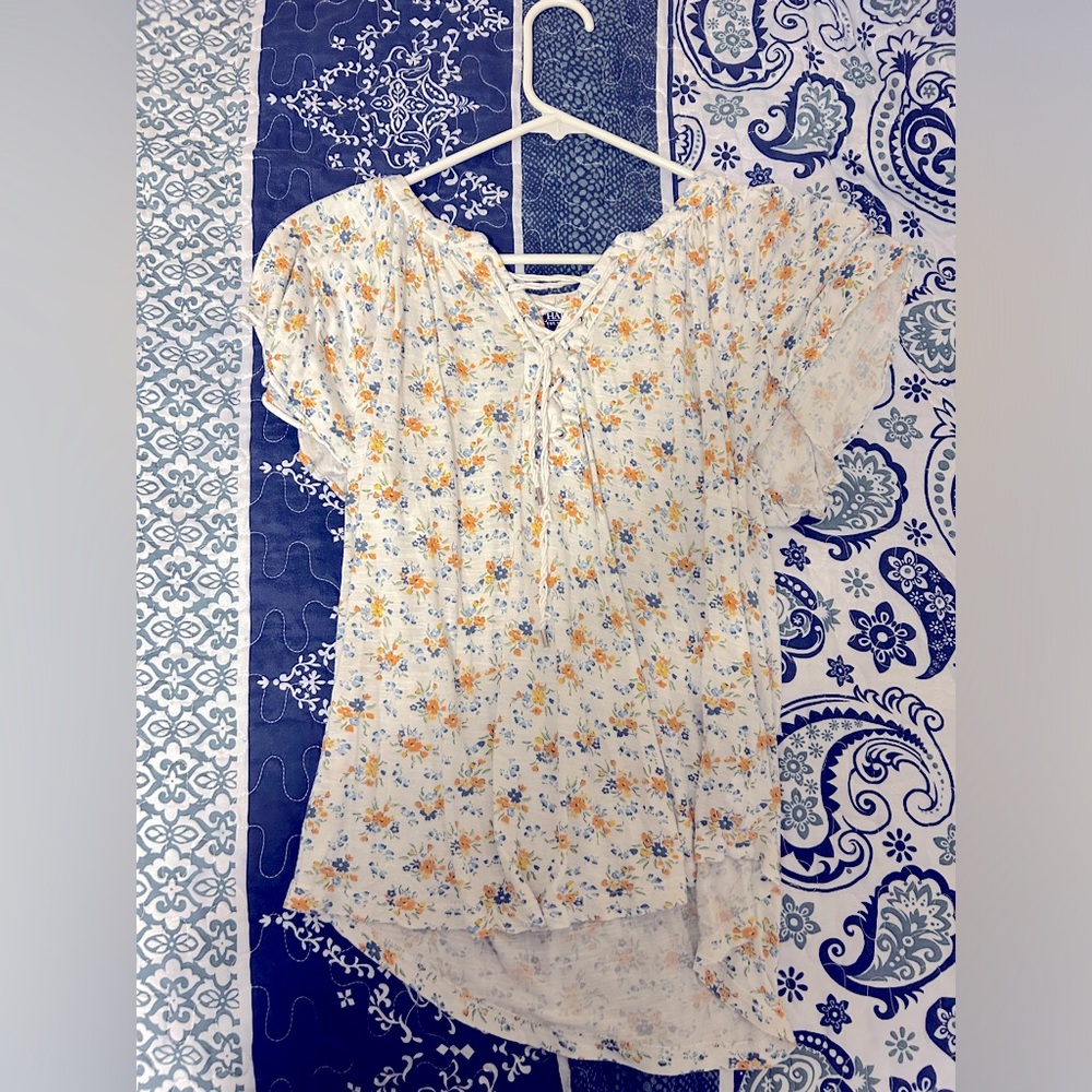 Women’s size small shirt.